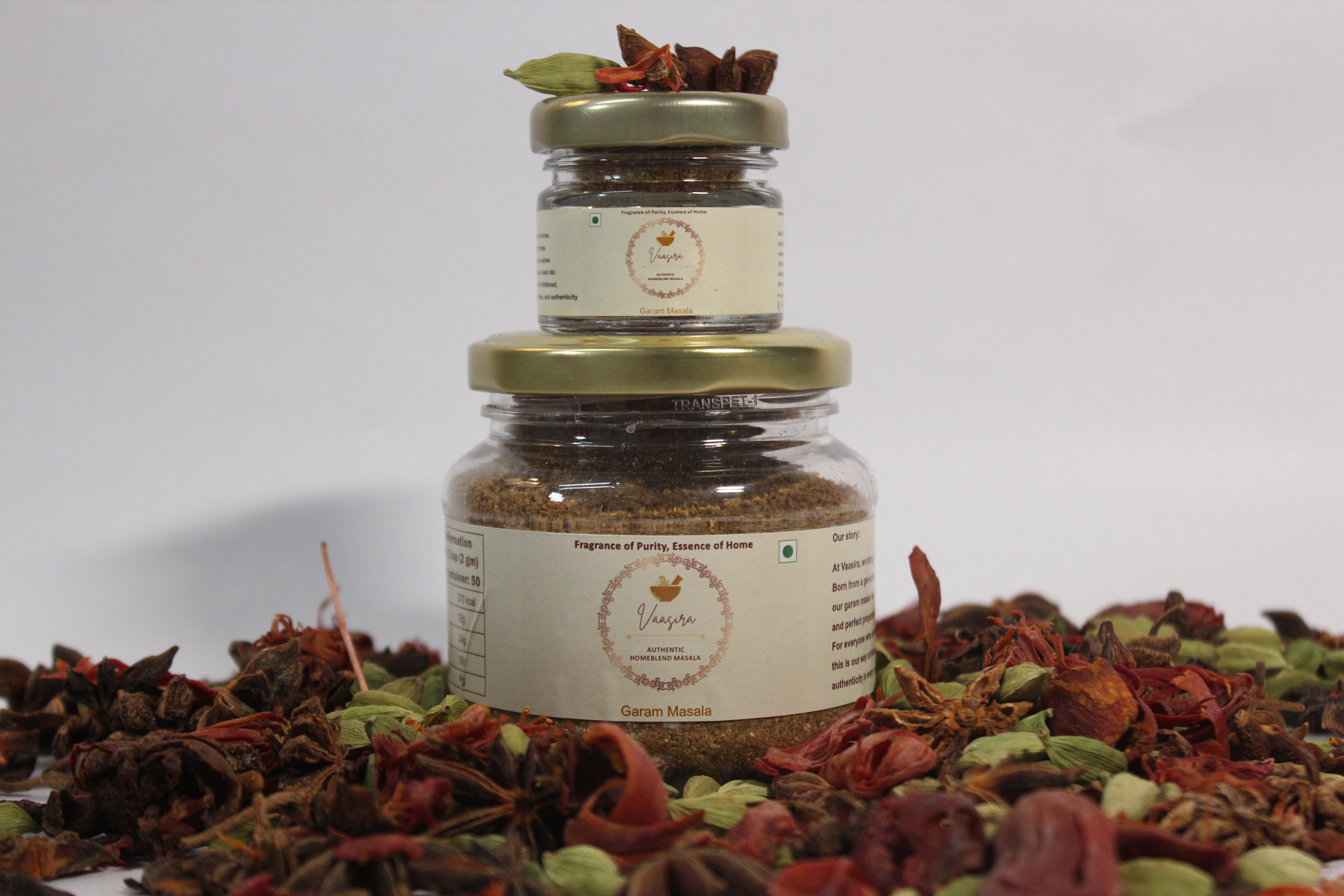 Home Blend Flavours 100g pack and free 15g sample, featuring aromatic spices and herbs for home cooking.